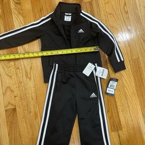 Adidas track suit! Size 2T. Brand new with tags.